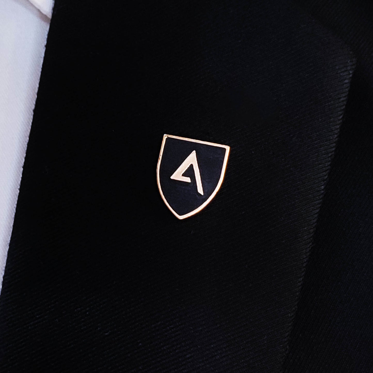 Classic Knight Shield – Black and Gold Lapel Pin